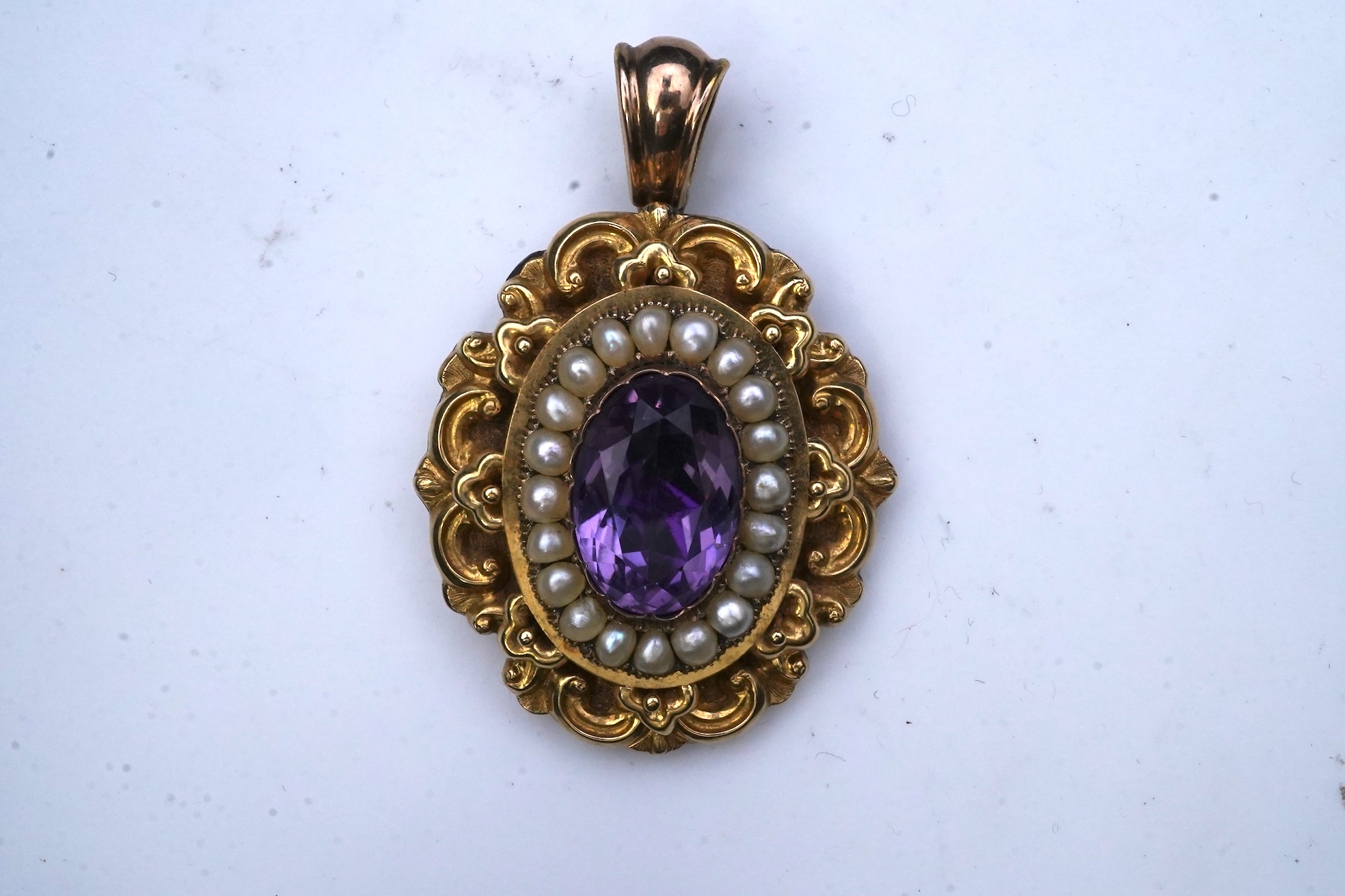 An early Victorian sentimental amethyst and half pearl pendant, circa 1843